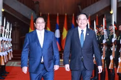 Thủ tướng Phạm Minh Chính hội kiến Thủ tướng Lào Sonexay Siphandone, Chủ tịch ASEAN 2024. (Ảnh: Dương Giang/TTXVN)
