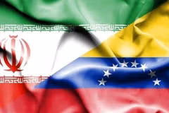 Quốc kỳ của Iran và Venezuela. Ảnh: IRNA/TTXVN