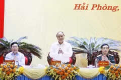 Chủ tịch nước Nguyễn Xuân Phúc chủ trì hội thảo. (Ảnh: Thống Nhất/TTXVN)