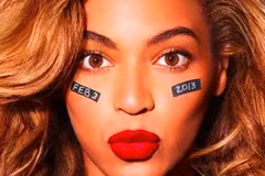 Gương mặt Beyonce với hai bên má ghi ngày tổ chức trận đấu. (Nguồn: beyonce.com)