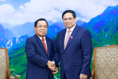 Thủ tướng Phạm Minh Chính tiếp Tổng Thanh tra Nhà nước Lào Khamphan Phommathat. (Ảnh: Dương Giang/TTXVN)