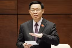 Phó Thủ tướng Vương Đình Huệ trả lời chất vấn của Đại biểu Quốc hội. (Ảnh: Văn Điệp/TTXVN)