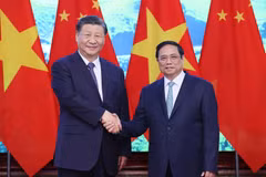 Thủ tướng Phạm Minh Chính và Tổng Bí thư, Chủ tịch nước Trung Quốc Tập Cận Bình chụp ảnh chung. (Ảnh: Dương Giang/TTXVN)