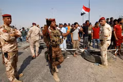 Binh sỹ Iraq làm nhiệm vụ tại cảng Umn Qasr ở thành phố Basra. (Nguồn: Reuters)