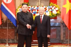 Tổng Bí thư, Chủ tịch nước Nguyễn Phú Trọng đón Chủ tịch Triều Tiên Kim Jong-un. (Ảnh: Doãn Tấn/TTXVN)