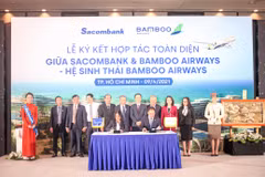 Lãnh đạo hai bên tham gia ký kết. (Ảnh: CTV/Vietnam+)