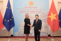Phó Thủ tướng, Bộ trưởng Bộ Ngoại giao Phạm Bình Minh với Phó Chủ tịch Ủy ban châu Âu Federica Mogherini. (Ảnh: Lâm Khánh/TTXVN)