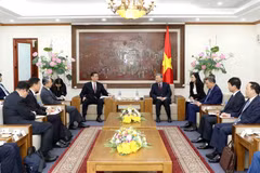 Đại tướng Tô Lâm, Bộ trưởng Bộ Công an tiếp Thứ trưởng Bộ Công an Trung Quốc Trần Tư Nguyên. (Ảnh: Phạm Kiên/TTXVN)