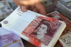 Đồng 50 bảng Anh. (Nguồn: AFP/TTXVN) 