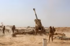  Các lực lượng Iraq làm nhiệm vụ trong chiến dịch chống IS tại tỉnh Anbar ngày 12/9. (Nguồn: AFP/TTXVN)