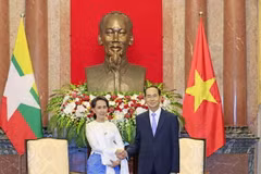 Chủ tịch nước Trần Đại Quang tiếp Cố vấn Nhà nước Myanmar Aung San Suu Kyi. (Ảnh: Nhan Sáng/TTXVN)