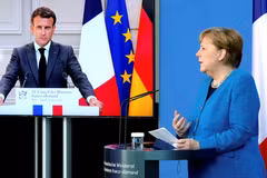 Tổng thống Pháp Emmanuel Macron và Thủ tướng Đức Angela Merkel tại một hội nghị chung. (Nguồn: Reuters)