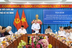 Ông Phan Văn Mãi, Chủ tịch UBND Thành phố Hồ Chí Minh, phát biểu khai mạc Tọa đàm. (Ảnh: Đinh Hằng/TTXVN)