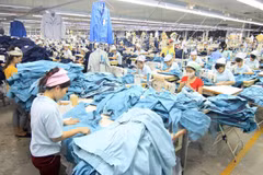Dây chuyền dệt may xuất khẩu. (Nguồn: TTXVN)