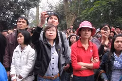 Háo hức đợi đến giờ thiêng (Ảnh: PV/Vietnam+)