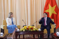 Thủ tướng Phạm Minh Chính và các đại biểu cắt băng khai mạc Triển lãm Kinh tế xanh GEFE 2022. (Ảnh: Dương Giang/TTXVN) 
