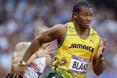 Yohan Blake đeo chiếc đồng hồ nửa triệu USD ở vòng bán kết đường chạy 200m. (Nguồn: AP)