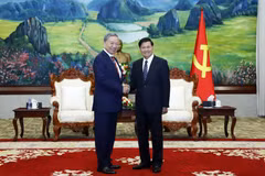 Tổng Bí thư, Chủ tịch nước Lào Thongloun Sisoulith đón Đại tướng, Bộ trưởng Bộ Công an Tô Lâm đến chào xã giao. (Ảnh: Phạm Kiên/TTXVN)
