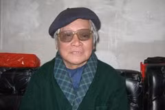 Nhà Hà Nội học Nguyễn Vinh Phúc nói chuyện về Tết. (Ảnh: Thiên Linh/ Vietnam+)