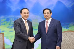 Thủ tướng Phạm Minh Chính tiếp Bộ trưởng Bộ Y tế Lào Bounfeng Phoummalaysith. (Ảnh: Dương Giang/TTXVN)