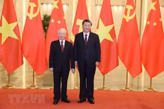Tổng Bí thư Nguyễn Phú Trọng và Tổng Bí thư, Chủ tịch Trung Quốc Tập Cận Bình. (Nguồn: TTXVN)