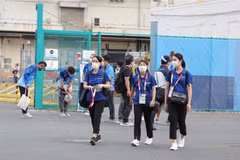 Hình ảnh các tình nguyện viên tại Paralympic Tokyo 2020. (Ảnh: Phạm Tuân/TTXVN)
