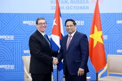 Thủ tướng Phạm Minh Chính tiếp Bộ trưởng Ngoại giao Cuba Bruno Rodriguez Parrilla. (Ảnh: Dương Giang/TTXVN)