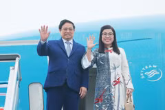 Thủ tướng Phạm Minh Chính và Phu nhân. (Ảnh: Dương Giang/TTXVN)