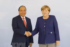 Thủ tướng Đức Angela Merkel và Thủ tướng Nguyễn Xuân Phúc. (Ảnh: Thống Nhất/TTXVN)
