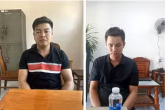 Đối tượng Võ Trần Hoàng (phải) và Ngô Phước Thịnh tại cơ quan điều tra. Ảnh: TTXVN phát