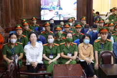 Các bị cáo tại phiên tòa ngày 11/3. (Ảnh: Thanh Vũ/TTXVN)