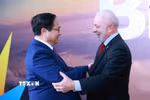 Tổng thống Cộng hòa Liên bang Brazil Lula da Silva đón Thủ tướng Phạm Minh Chính. (Ảnh: Dương Giang/TTXVN)