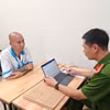 Lê Văn Phú (tức Phú Lê) tại cơ quan điều tra. (Ảnh: CAHN)