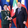 Đại tướng Phan Văn Giang và Bộ trưởng Bộ Quốc phòng Philippines Gilberto Teodoro. (Ảnh: Phương Thảo/Vietnam+)