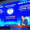 GS.TS. Nguyễn Hiếu Minh, Phó Giám đốc Học viện Kỹ thuật mật mã phát biểu khai mạc hội thảo. (Ảnh: PV/Vietnam+)