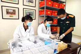 Nơi tiếp nhận, kiểm tra mẫu sinh phẩm hài cốt liệt sỹ tại Trung tâm Giám định ADN thuộc Viện Sinh học (Viện Hàn lâm Khoa học và Công nghệ Việt Nam). (Ảnh: An Đăng/TTXVN)