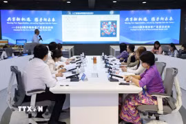 Sự kiện thu hút nhiều đại diện truyền thông cấp cao và chuyên gia học thuật từ Trung Quốc và các nước ASEAN tham dự. (Ảnh: Quang Hưng/TTXVN)
