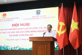 Đại sứ Việt Nam tại Lào Nguyễn Minh Tâm phát biểu khai mạc Hội nghị. (Ảnh: Xuân Tú/TTXVN)