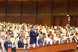 Tổng Bí thư, Chủ tịch nước Tô Lâm và các đại biểu dự hội nghị tại điểm cầu Trung tâm Nhà Quốc hội (Hà Nội). (Ảnh: Thống Nhất/TTXVN)