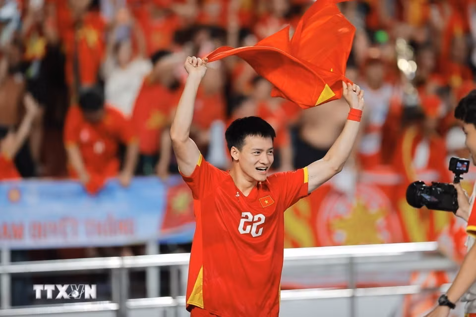Thanh Nhàn hân hoan trong niềm vui chiến thắng. (Ảnh: Minh Quyết/TTXVN)