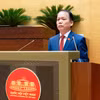 Bộ trưởng Bộ Tư pháp Hoàng Thanh Tùng trình bày Báo cáo đánh giá tình hình thi hành Nghị quyết số 206/2025/QH15 của Quốc hội. (Ảnh: Quốc hội)