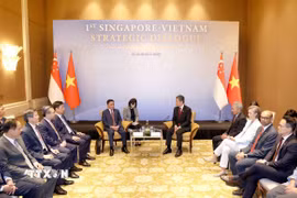 Phó Tổng Thư ký Đảng Hành động Nhân dân Singapore, Bộ trưởng Bộ Quốc phòng kiêm Bộ trưởng Điều phối dịch vụ công Chan Chun Sing chủ trì Lễ đón chính thức Ủy viên Bộ Chính trị, Thường trực Ban Bí thư Trần Cẩm Tú. (Ảnh: Phương Hoa/TTXVN)