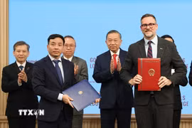 Tổng Bí thư, Chủ tịch nước Tô Lâm chứng kiến lễ trao văn kiện, thỏa thuận hợp tác của Việt Nam với các cơ quan của Liên hợp quốc. (Ảnh: Thống Nhất/TTXVN)
