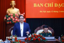 Thủ tướng Phạm Minh Chính làm việc với Bộ Quốc phòng và các bộ, ngành về kết quả hoạt động nghiên cứu, sản xuất, phát triển công nghiệp quốc phòng. (Ảnh: Dương Giang/TTXVN)