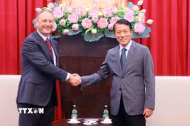 Đại tướng Lương Tam Quang, Bộ trưởng Bộ Công an tiếp ông Andrew Cope, Tổng Giám đốc phụ trách kinh doanh khu vực châu Á-Thái Bình Dương của Nokia. (Ảnh: Phạm Kiên/TTXVN)