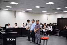 Ba bị cáo tại phiên tòa. (Ảnh: Kim Anh/TTXVN)