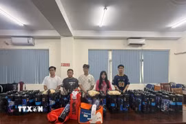 Các đối tượng tại cơ quan công an. (Ảnh: TTXVN phát)