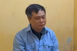 Bị can Phạm Văn Long, Hiệu trưởng trường Cao đẳng Du lịch Hà Nội. (Ảnh: Công an cung cấp)