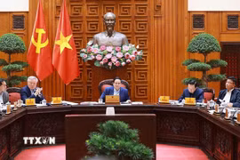 Thủ tướng Phạm Minh Chính chủ trì họp Thường trực Chính phủ về phát triển Đề án Khu thương mại tự do và Trung tâm lọc hóa dầu và năng lượng quốc gia tại Dung Quất. (Ảnh: Dương Giang/TTXVN)