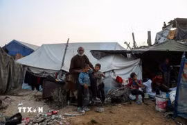 Người dân Palestine tại Dải Gaza. (Ảnh: THX/TTXVN)
